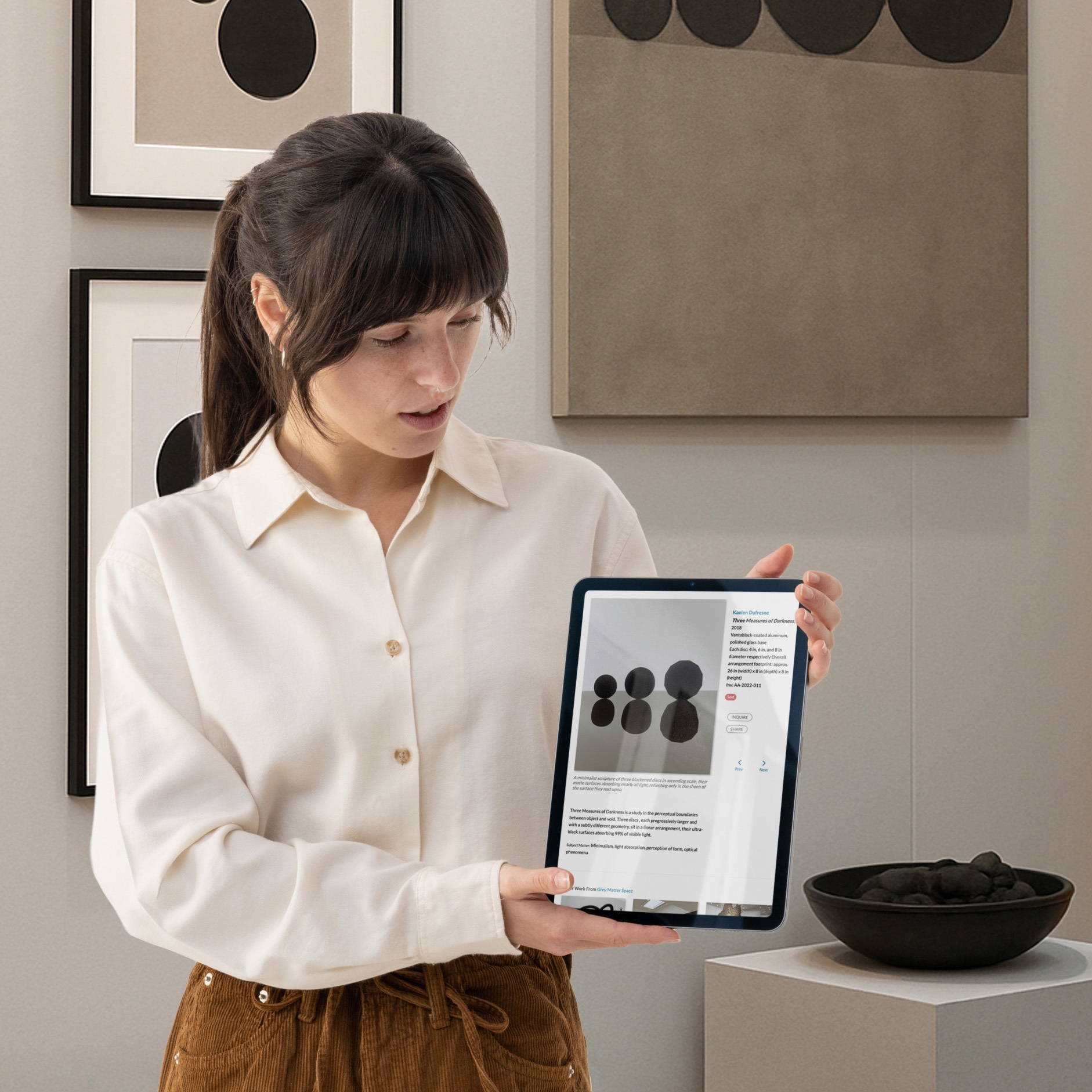 Phone showing artwork interface